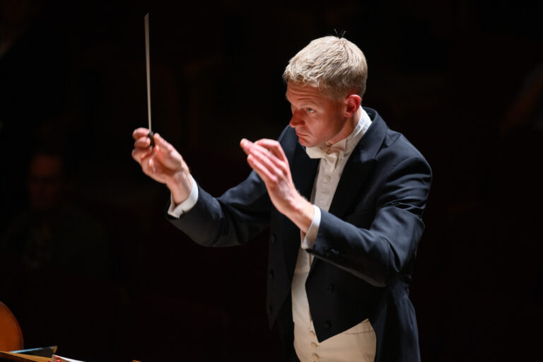 Photo of Lewis Gaston Conducting